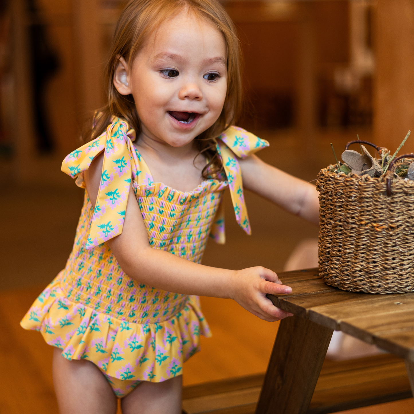 Sophia Smocked Tie Swimsuit in Marigold Bloom