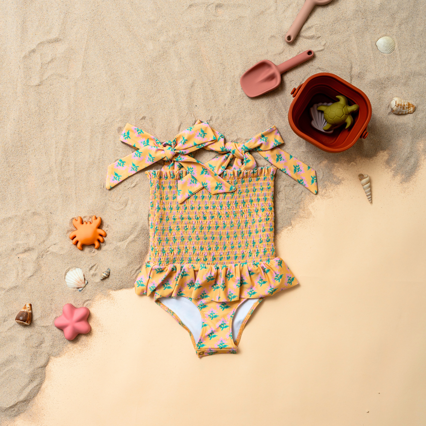 Sophia Smocked Tie Swimsuit in Marigold Bloom