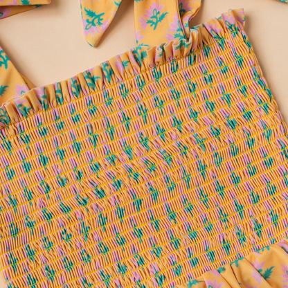 Sophia Smocked Tie Swimsuit in Marigold Bloom