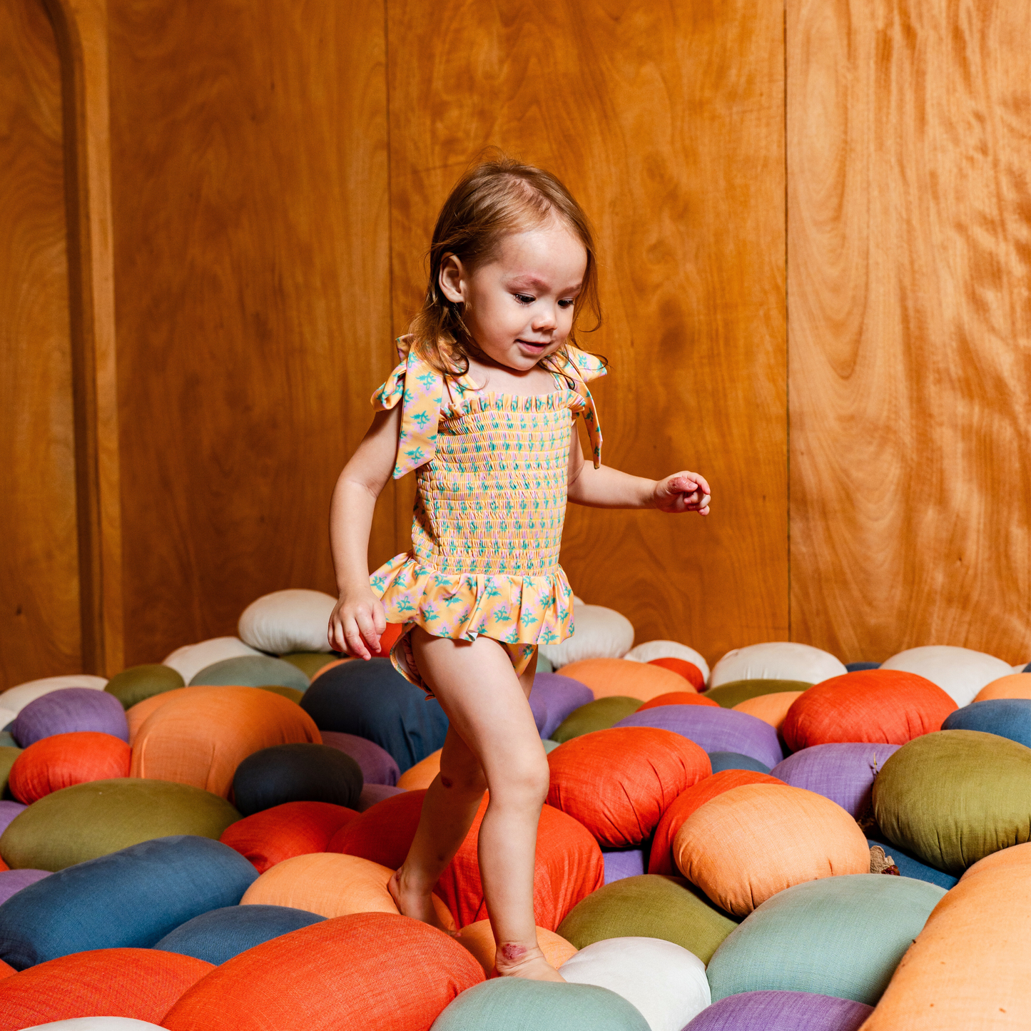 Sophia Smocked Tie Swimsuit in Marigold Bloom